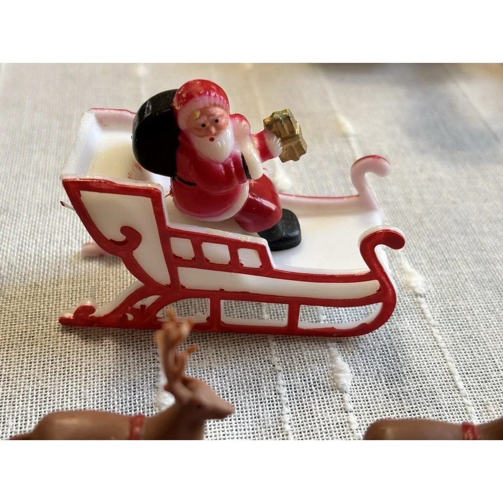 Vintage Look Miniature Plastic Santa in His Sleigh with Reindeer Cake Topper